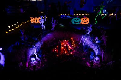 An elaborate Halloween display in a front yard