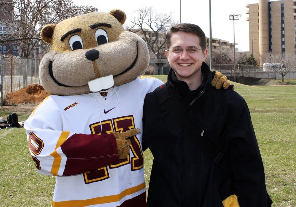 Law student Kyle Kroll and Goldy Gopher