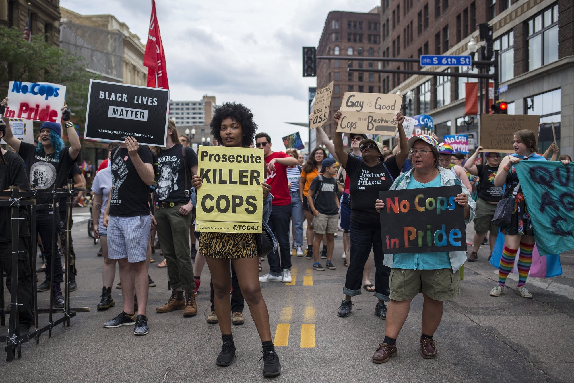 A group of protestors occupied Hennepin Avenue during Pride parade.