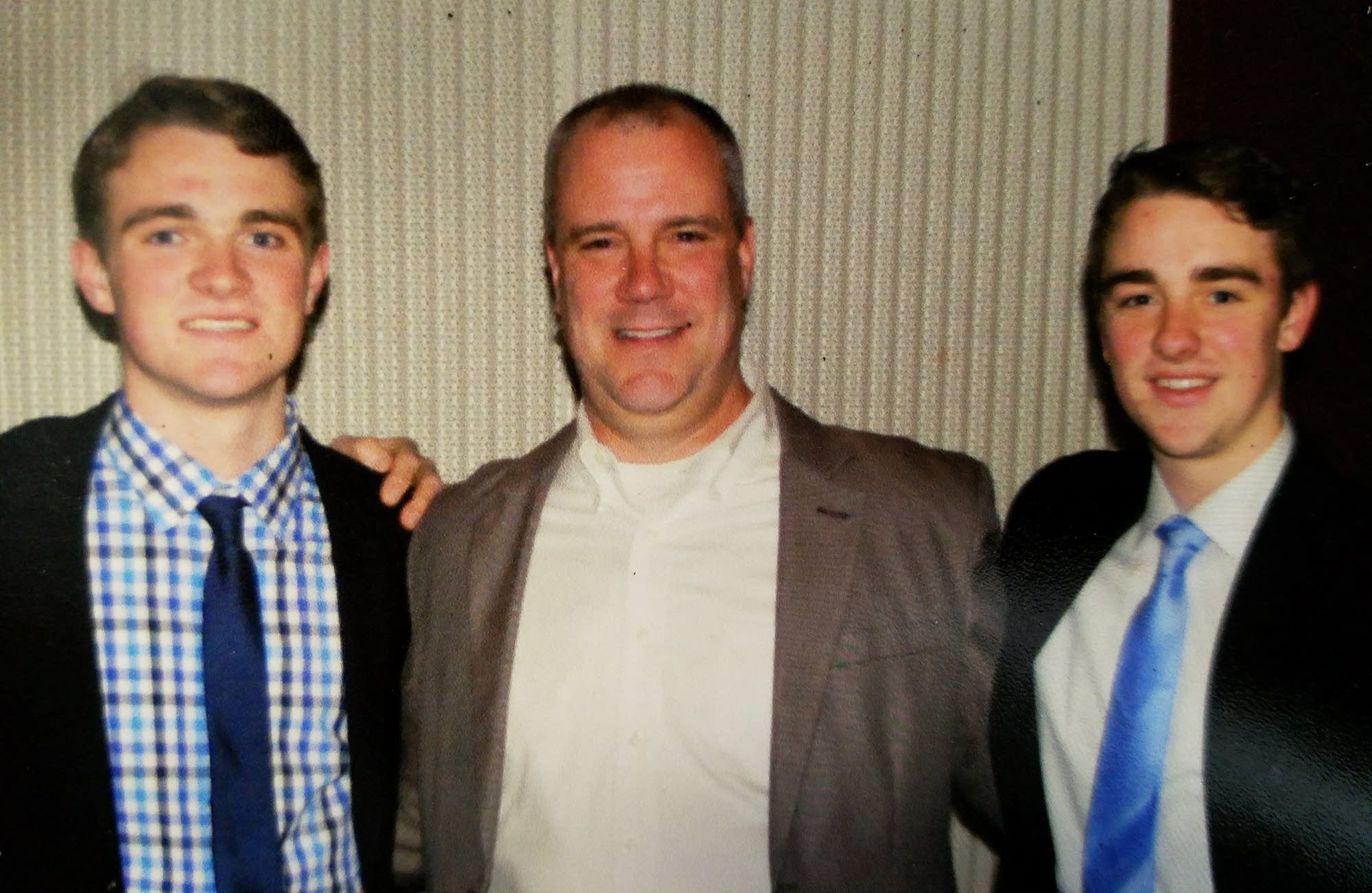 Robert, Ray, Sr., and Ray Christy, Jr., at the MSHSL hockey banquet, 2017.