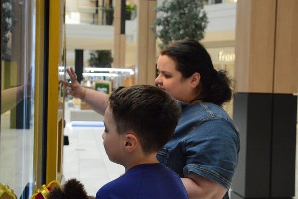 People look at vending machine
