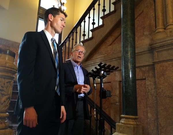 Attorneys Mike Finnegan, left, and Jeff Anderson