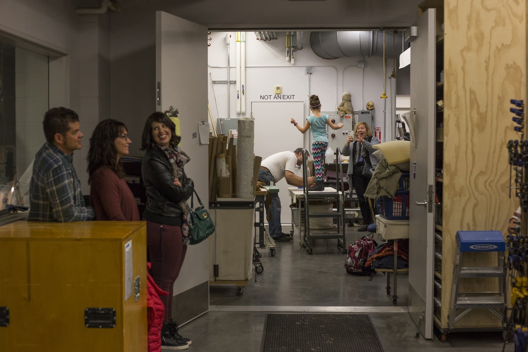 Tony and Anne Jones wait as Sophie gets Tiny Tim's leg brace fitted.