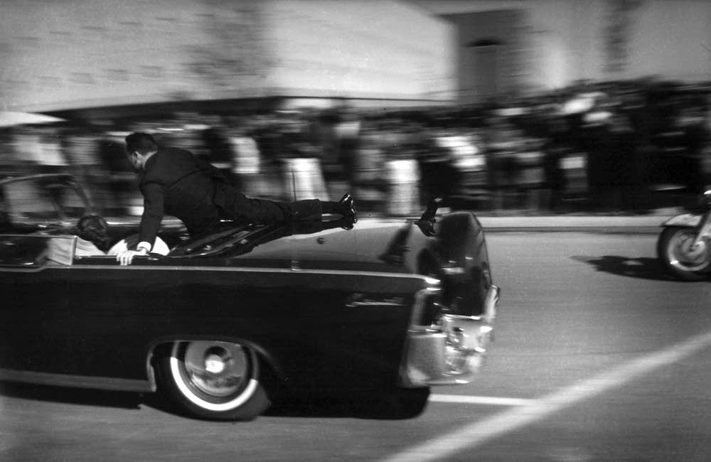 Mortally wounded President John F. Kennedy