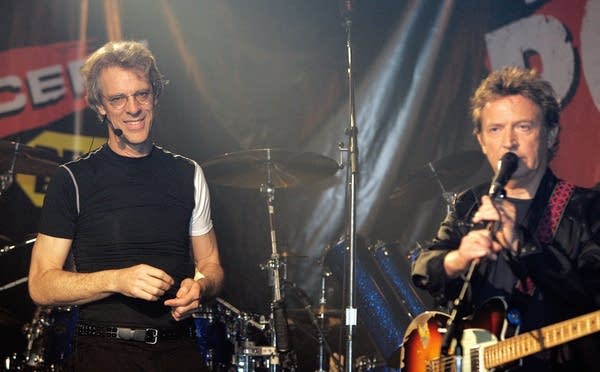 Members of The Police — guitarist Andy Summers (R) and drummer Stewart Copeland — talk with the audience after a performance at the Whiskey a Go-Go in West Hollywood, California, February 12, 2007. After a presentation at the 49th Grammy Awards the previous day, the band played again a few songs that served as a background for their announcement of a worldwide tour to mark their 30th anniversary, their first in more than 20 years, which will kick off in Vancouver on May 28.