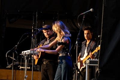 Ocie Elliott performing on stage