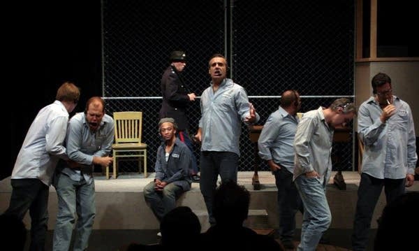 The ensemble in a musical Shawshank Redemption.