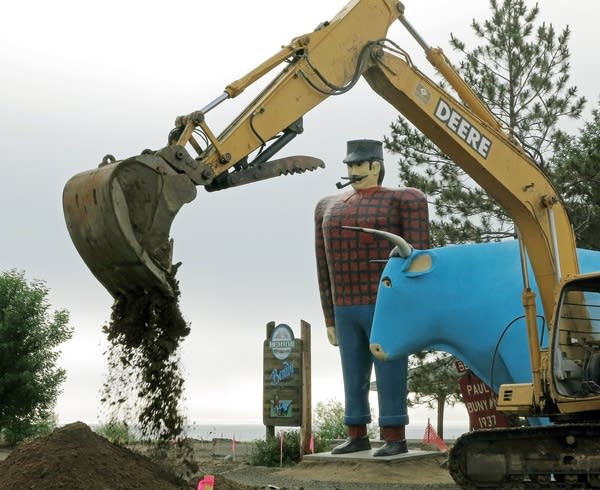 Backhoe excavated around Paul and Babe.