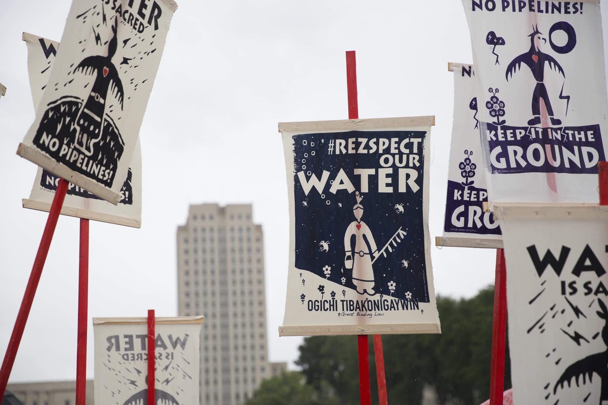 Signs at a rally in Bismarck.