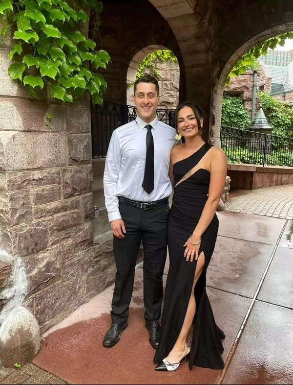 A couple dressed up for an event.