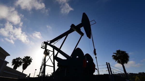 An oil pumpjack in California. The industry is suffering from a glut that drove futures prices below zero.