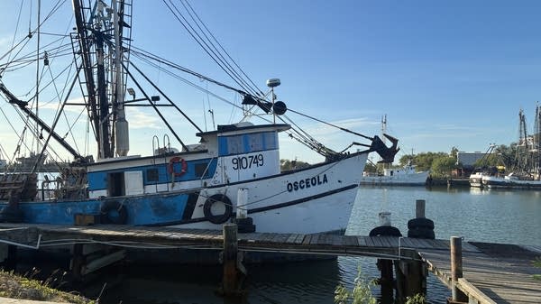 A shrimping boat sits idle at the Brownsville Fishing Harbor as many fishermen sit out the season due to high diesel prices. 
