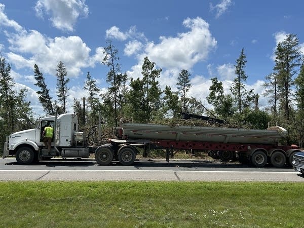 964cf9-20250729-semi-truck-with-tree-debris-600 Fixed Bemidji-Erea trees are installed for cleaning