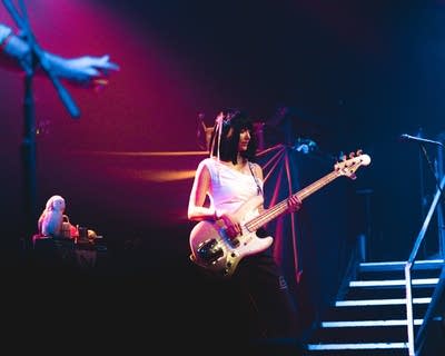 Khruangbin performing on stage