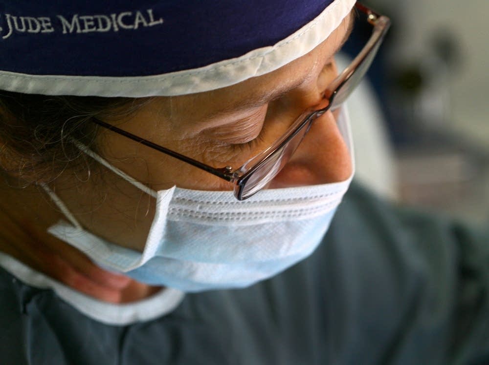 Kim Culbertson performs surgery
