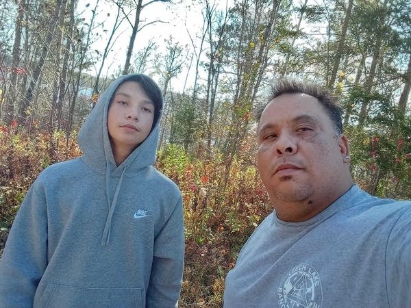 Two people pose for a selfie.