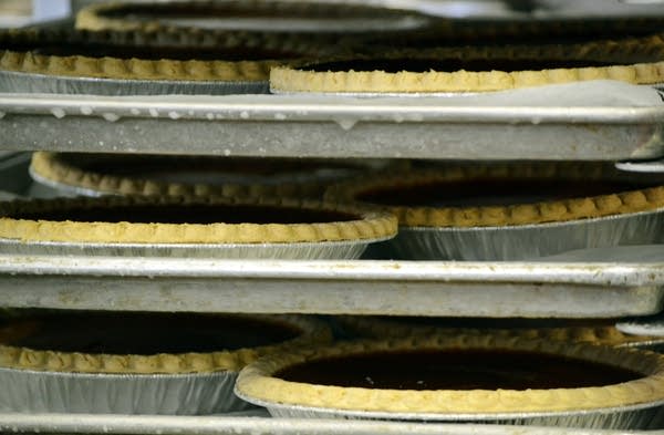 Pies cool on a rack.