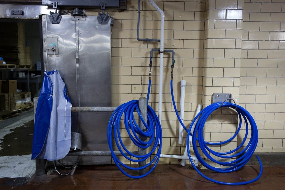 An apron and hoses at Olsen Fish Company