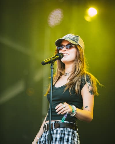 lead singer of porch light performing on stage