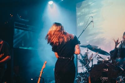 she's green performing on stage