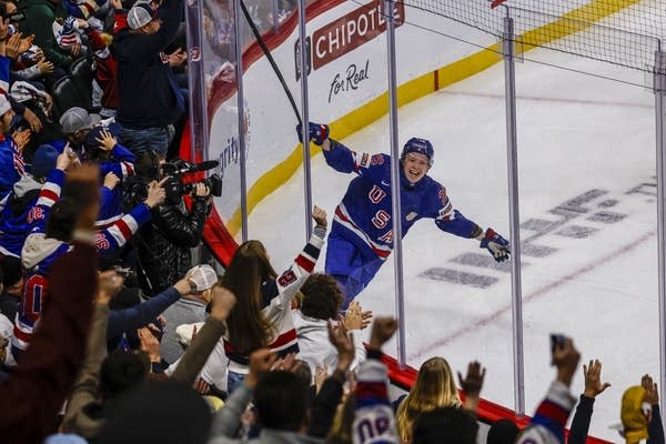 A hockey player celebrates