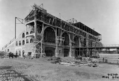 A black and white photo of construction in the works.