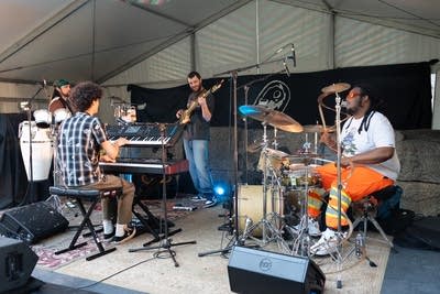 the band room3 performing on stage