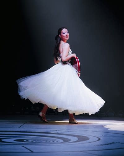 Laufey performing on stage