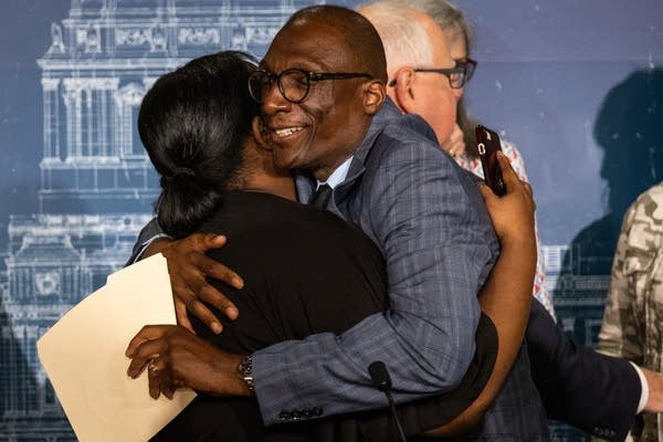 Two Black legislators embrace