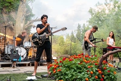 Cloud Cult performing on stage