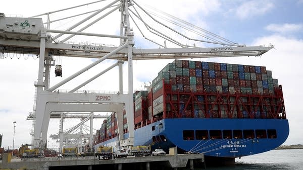 An East China Sea container ship in the Port of Oakland in 2018. China's economy has grown 900% since 2001, causing a tariff imbalance.