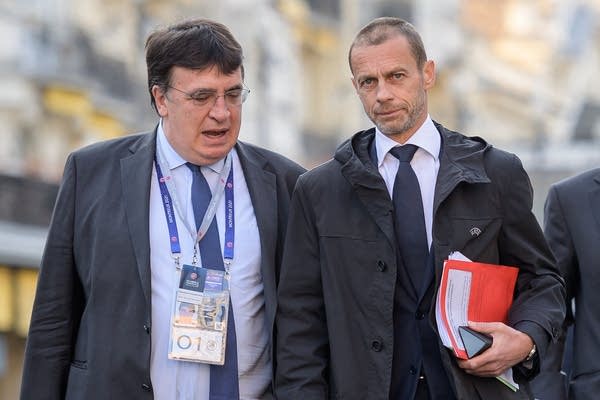 British Prime Minister Boris Johnson is also opposed to the European Super League, which he calls "ludicrous." Pictured: UEFA President Aleksander Ceferin (right) and UEFA General Secretary Theodore Theodoridis. 