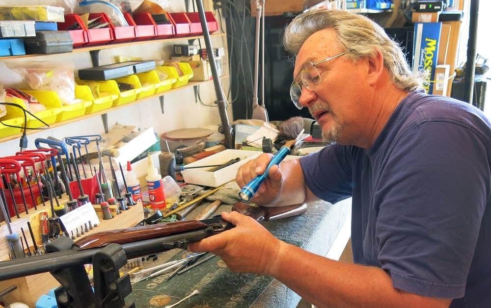 Ed Bergum tinkers on a pump act .22 rifle.