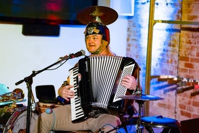 one person band performing on stage