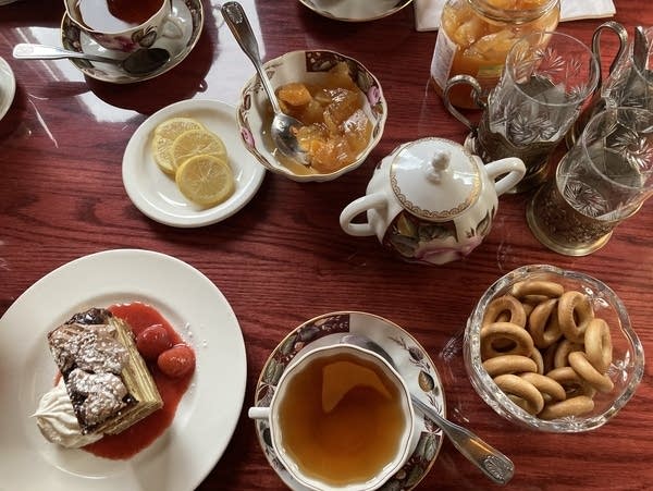 table set with tea and sweet treats