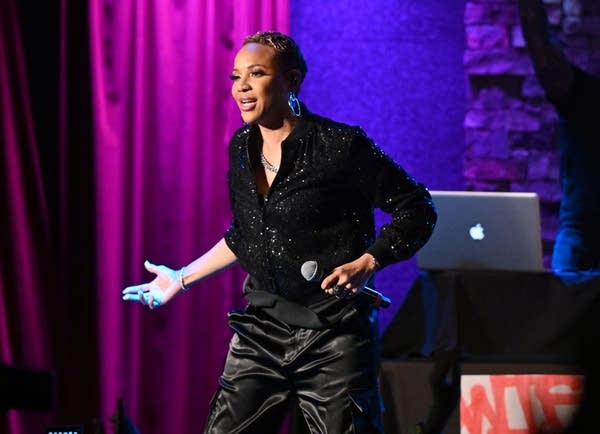 mc lyte performing on stage