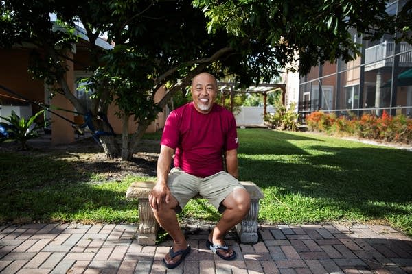 Former Minnesota Representative Cy Thao poses for a portrait