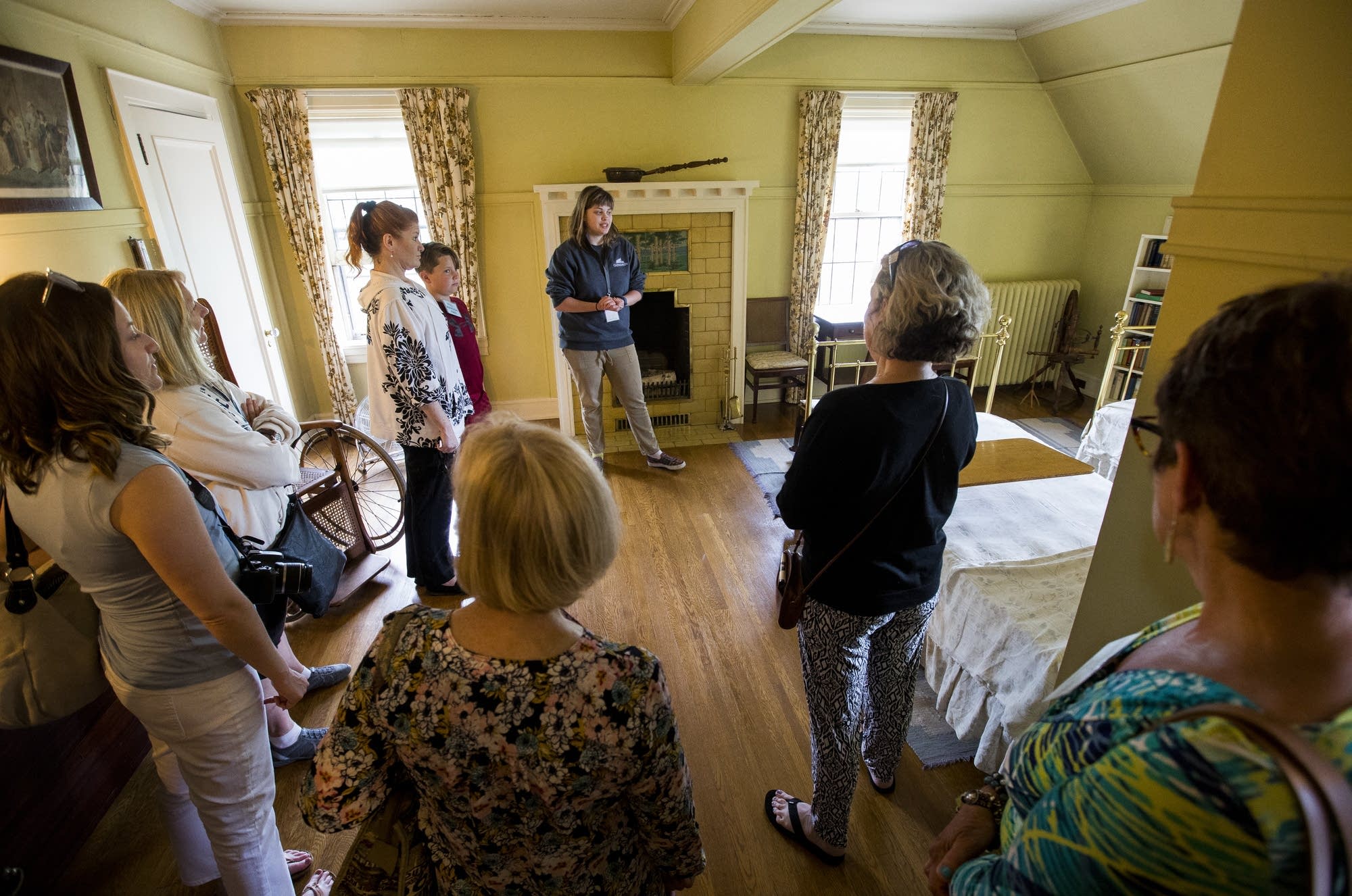 A tour guide shares facts and details about the mansion and Congdon family.