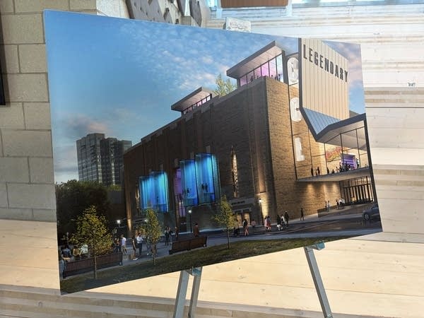 A concept rendering is on display on a metal easel.