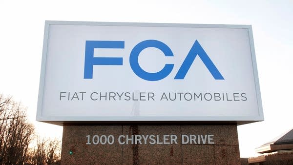 The Fiat Chrysler Automobiles Group sign is shown at the Chrysler Group headquarters in Auburn Hills, Michigan. 