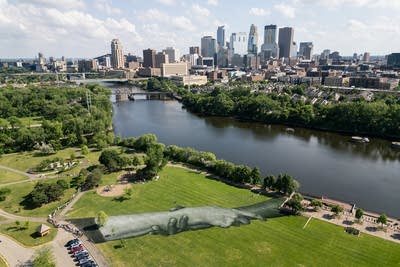 Massive public art project by Saype debuts at Boom Island Park in Minneapolis on Friday