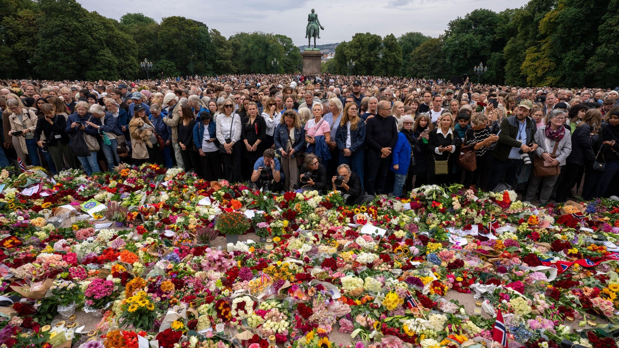 Norwegians line up at memorials remembering the late King Harald V; funeral set for Sept. 9