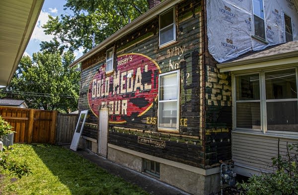 A sign on a home