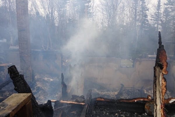 Oil field worker flees wildfire but finds house back home destroyed