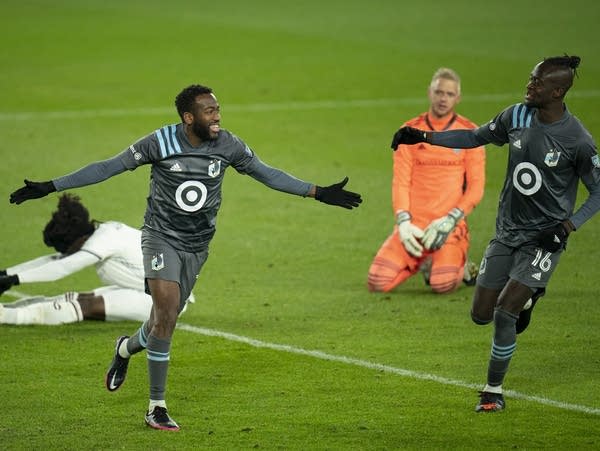 Minnesota United midfielder Kevin Molino celebrates his second goal