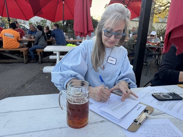 A woman writing a letter