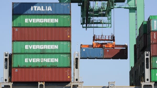 Containers are offloaded from a ship at the Port of Los Angeles, the nation's busiest. 