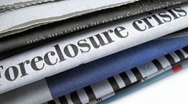 Foreclosure headline in a newspaper