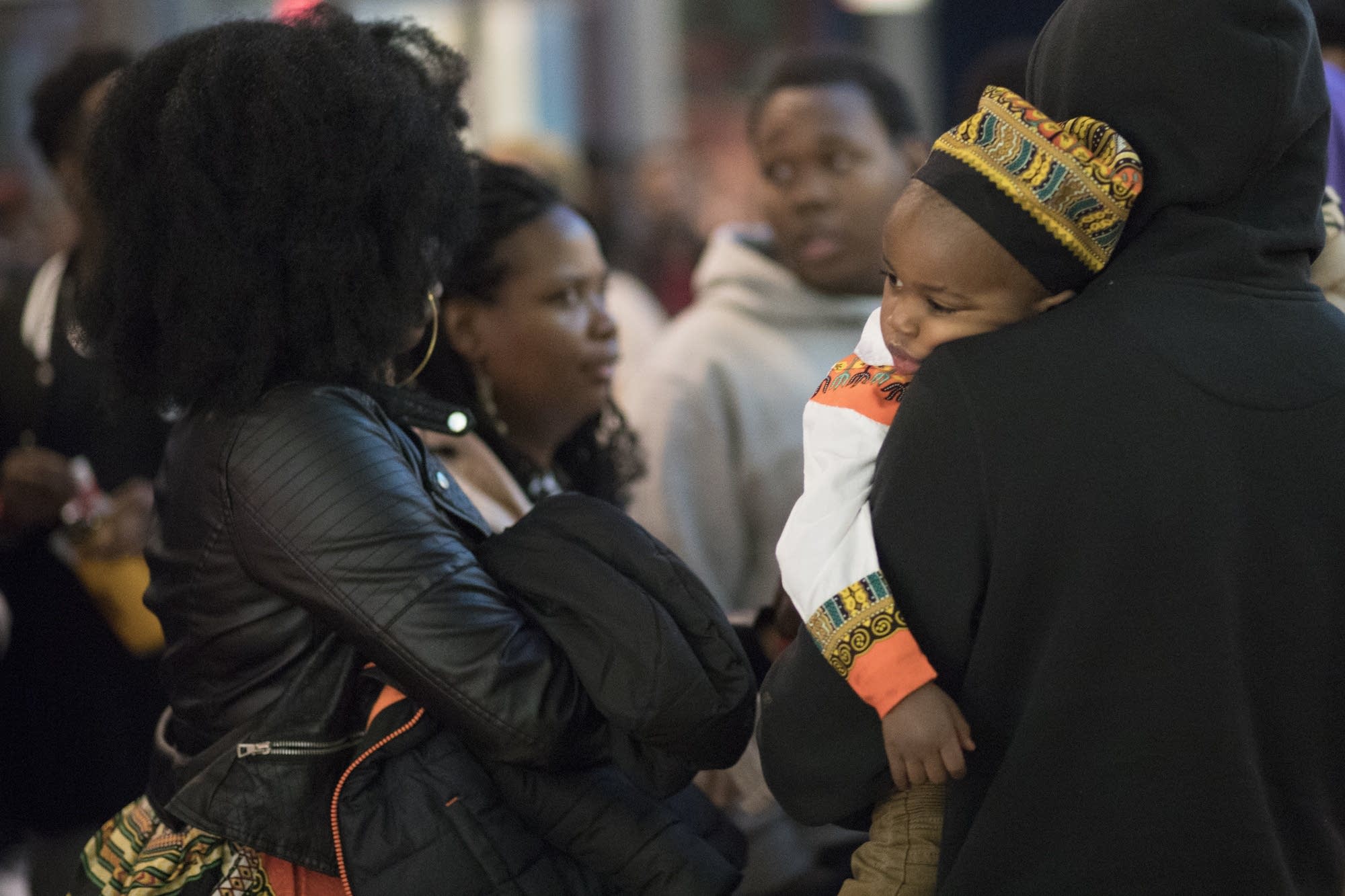 Two-year old Everett Bryant, Jr., waits patiently in the lobby.
