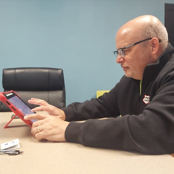 A person looks on an ipad
